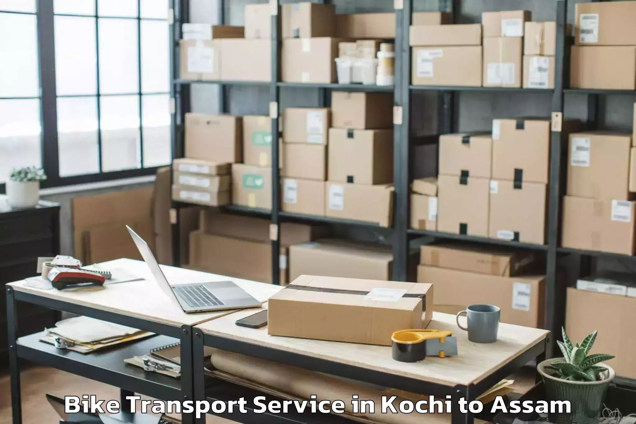 Top Kochi to Sualkuchi Bike Transport Available